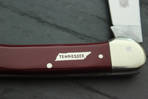 Vintage Canoe Pattern with Red Handles and Tennessee State Shield